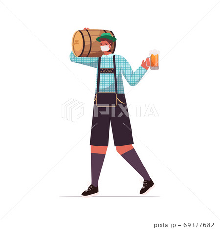 man in medical mask holding beer barrel and mug Oktoberfest party celebration coronavirus quarantine 69327682