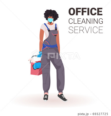 female professional office cleaner woman janitor in medical mask with cleaning equipment 69327725