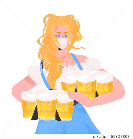 woman in medical mask holding beer mugs Oktoberfest party celebration coronavirus quarantine concept woman in medical mask holding beer mugs Oktoberfest party celebration coronavirus quarantine concept 69327808