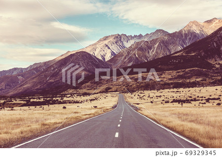 Road in New Zealand hills Road in New Zealand hills 69329345