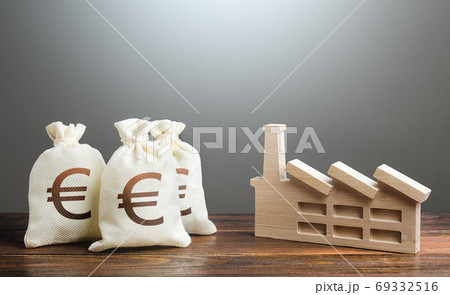 Euro money bags and industrial factory plant. Investment modernization, automation, reduction of the impact on environment. Privatization and purchase of industrial complexes. Supporting economy. 69332516