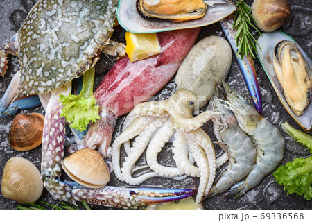 Fresh raw seafood buffet with lemon rosemary ingredients herb an Fresh raw seafood buffet with lemon rosemary ingredients herb an 69336568