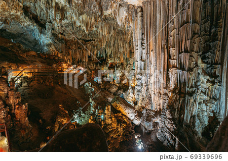 Nerja, Malaga Province, Andalusia, Spain. Cuevas De Nerja - Famous Caves. Different Rock Formations, Stalactites And Stalagmites In Nerja Caves. Natural Landmark Nerja, Malaga Province, Andalusia, Spain. Cuevas De Nerja - Famous Caves. Different Rock Formations, Stalactites And Stalagmites In Nerja Caves. Natural Landmark 69339696