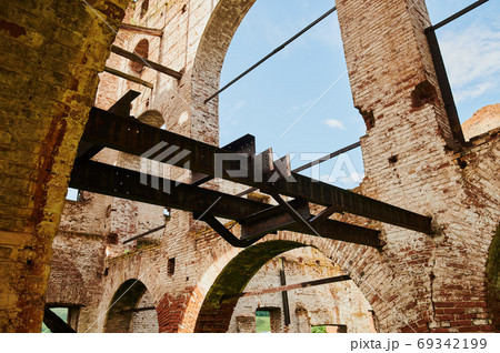 Landscape of ruined buildings at sunset, image of decrepitude or natural disaster. Landscape of ruined buildings at sunset, image of decrepitude or natural disaster. 69342199