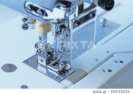 Industrial flat-seam sewing machine. Soft focus 69343020