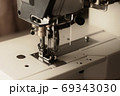 Industrial flat-seam sewing machine. Soft focus 69343030
