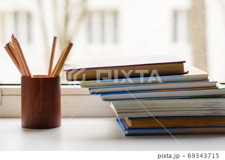 Sketch book and pencils on a windowsill Stock Photo - Alamy