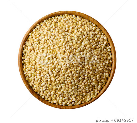 Quinoa seeds in wooden bowl on white. Quinoa seeds in wooden bowl on white. 69345917