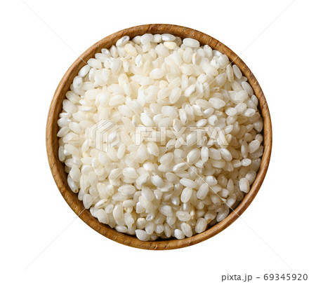 Dry white rice isolated on white background. Dry white rice isolated on white background. 69345920