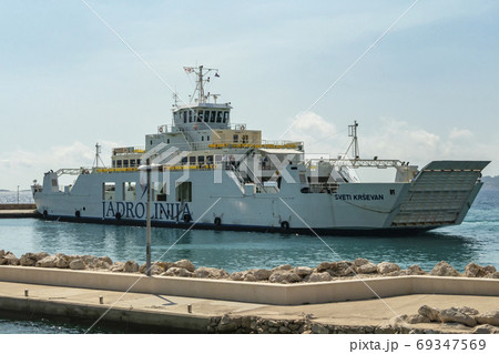 Ferry sailing between Orebic and Korcula island. Ferry sailing between Orebic and Korcula island. 69347569