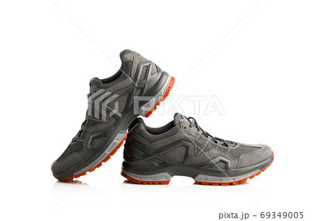 trekking sneakers with red sole, isolated on white trekking sneakers with red sole, isolated on white 69349005