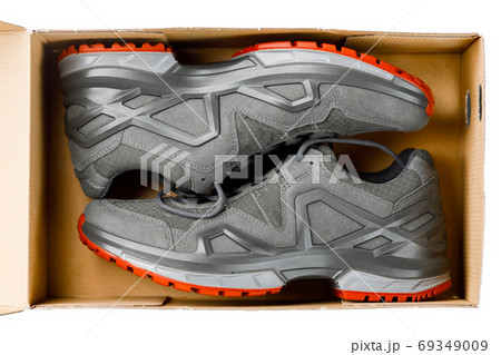 trekking sneakers in the box, isolated on white trekking sneakers in the box, isolated on white 69349009