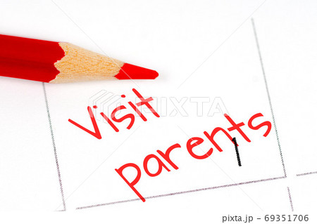 visit parents, calendar 1st day concept with red pencil 69351706