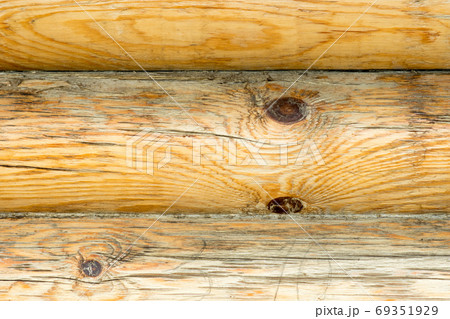 rounded wooden log wall closeup shot, natural material house rounded wooden log wall closeup shot, natural material house 69351929