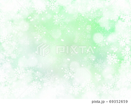 雪と結晶がキラキラ輝き降り積もる背景イラスト 薄緑のイラスト素材