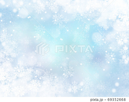 雪と結晶がキラキラ輝き降り積もる背景イラスト 水色のイラスト素材