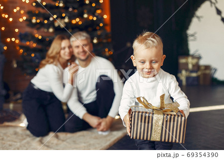 Family with little son at home near christmas tree 69354390