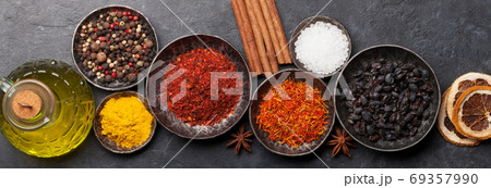 Various spices in bowls 69357990