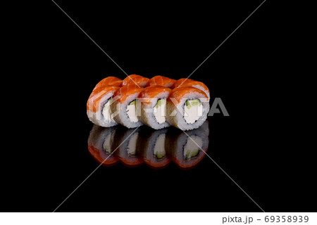 Fresh delicious beautiful sushi rolls on a dark background 69358939