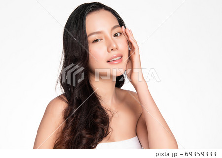 Beautiful young asian woman with clean fresh skin on white background, Face care, Facial treatment 69359333