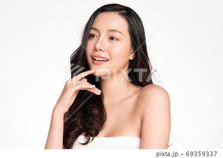 Beautiful young asian woman with clean fresh skin on white background, Face care, Facial treatment 69359337