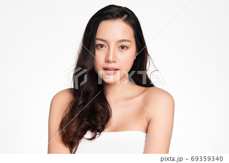 Beautiful young asian woman with clean fresh skin on white background, Face care, Facial treatment 69359340