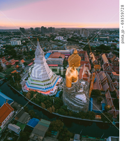 Aerial view of Wat Paknam Bhasicharoen, a temple, pagoda and Buddha statue in Bangkok Thailand Aerial view of Wat Paknam Bhasicharoen, a temple, pagoda and Buddha statue in Bangkok Thailand 69359728