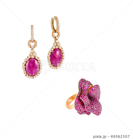 Pink tourmaline and sapphires jewelry ring and earrings in pink gold isolated on white background. Golden jewelery with diamonds, luxury jewelry. 69362507