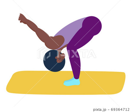 An athletic African-American woman does yoga An athletic African-American woman does yoga 69364712