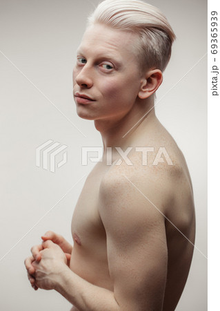 Shirtless Strong Athletic Sexy Muscular Male Model on White Background 69365939