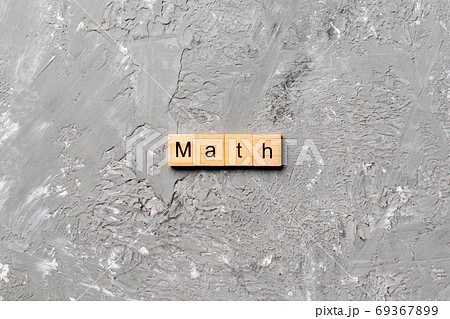 math word written on wood block. math text on table, concept 69367899