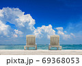 Couple of beach beds on tropical beach with beautyful blue sky 69368053