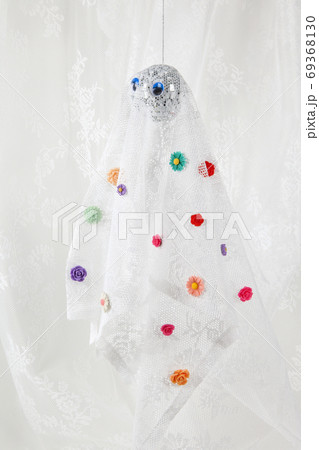 ghost in lace curtain with flowers 69368130