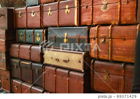 Old antique suitcases. Vintage retro styled texture. Horizontal Old antique suitcases. Vintage retro styled texture. Horizontal 69371429