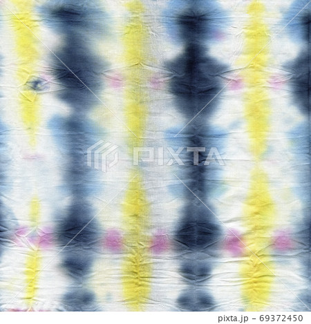 Tie dyed pattern on cotton fabric for background. 69372450