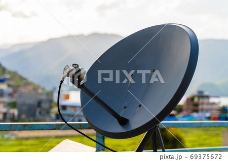 Sattelite dish for TV channels, stock photo Sattelite dish for TV channels, stock photo 69375672