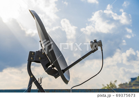 Sattelite dish for TV channels, stock photo Sattelite dish for TV channels, stock photo 69375673