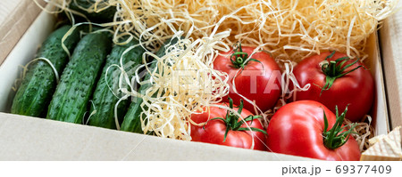 Wooden and cardboard crate box with fresh ripe Wooden and cardboard crate box with fresh ripe 69377409