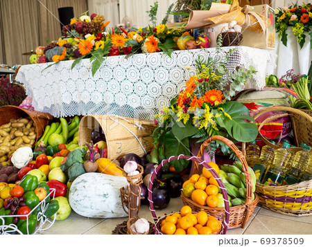 Many Vegetables, fruits and flowers are Decorated for Happy Thanksgiving Day Many Vegetables, fruits and flowers are Decorated for Happy Thanksgiving Day 69378509