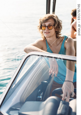 Smiling young sailor navigating in Caribbean sea 69378746