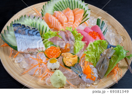 Mixed sashimi - japanese food style on black background Mixed sashimi - japanese food style on black background 69381349
