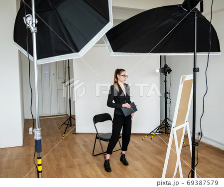 photo shoot backstage female producer studio light 69387579