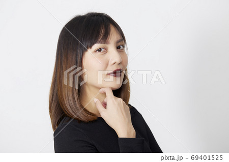 Asian Woman in black dress on white 69401525