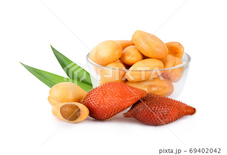 salak fruit in the glass bowl with green leaf isolated on white salak fruit in the glass bowl with green leaf isolated on white 69402042