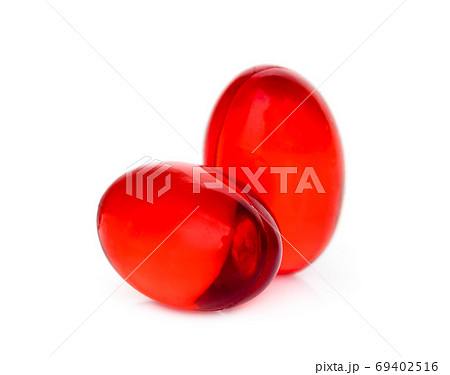 two red soft gel capsule isolated on white background two red soft gel capsule isolated on white background 69402516