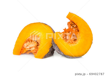 sliced two pumpkin with seeds isolated on white background 69402787