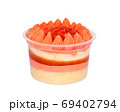 orange cupcake isolated on white background 69402794