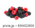 raspberries and blackberries isolated on white background 69402800