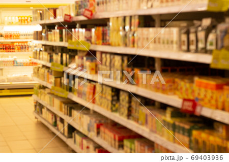 Supermarket shelves blurred background Supermarket shelves blurred background 69403936