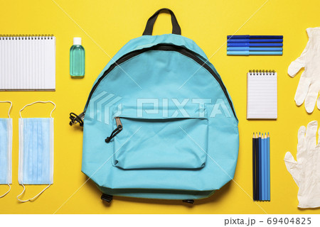 School supplies in a pandemic, flat lay. Back to school concept School supplies in a pandemic, flat lay. Back to school concept 69404825